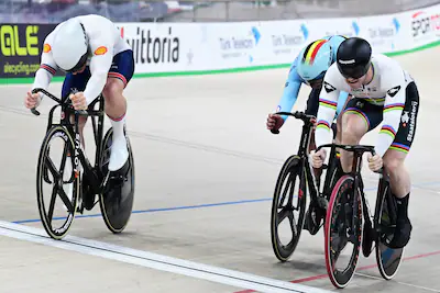 british-matthew-richardon-belgian-lowie-nulens-and-dutch-harrie-lavreysen-sprint-to-the-finish-of-th.webp