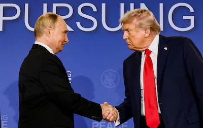file-photo-u-s-president-donald-trump-and-russian-president-vladimir-putin-shake-hands-during-a-pres.webp