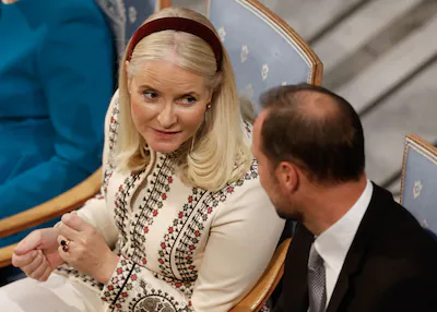 files-crown-princess-mette-marit-of-norway-talks-with-crown-prince-haakon-of-norway-r-as-they-attend.webp
