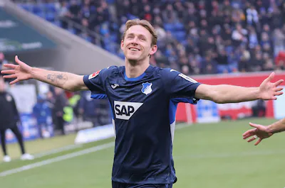 hoffenheim-s-dutch-midfielder-18-wouter-burger-celebrates-scoring-the-opening-goal-during-the-german.webp