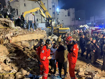 rescue-teams-search-for-survivors-after-a-building-collapsed-in-tripoli-lebanon-february-8-2026-reut.webp