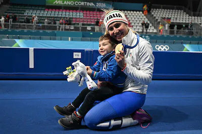 topshot-gold-medallist-italy-s-francesca-lollobrigida-poses-with-her-son-tommaso-after-competing-in.webp